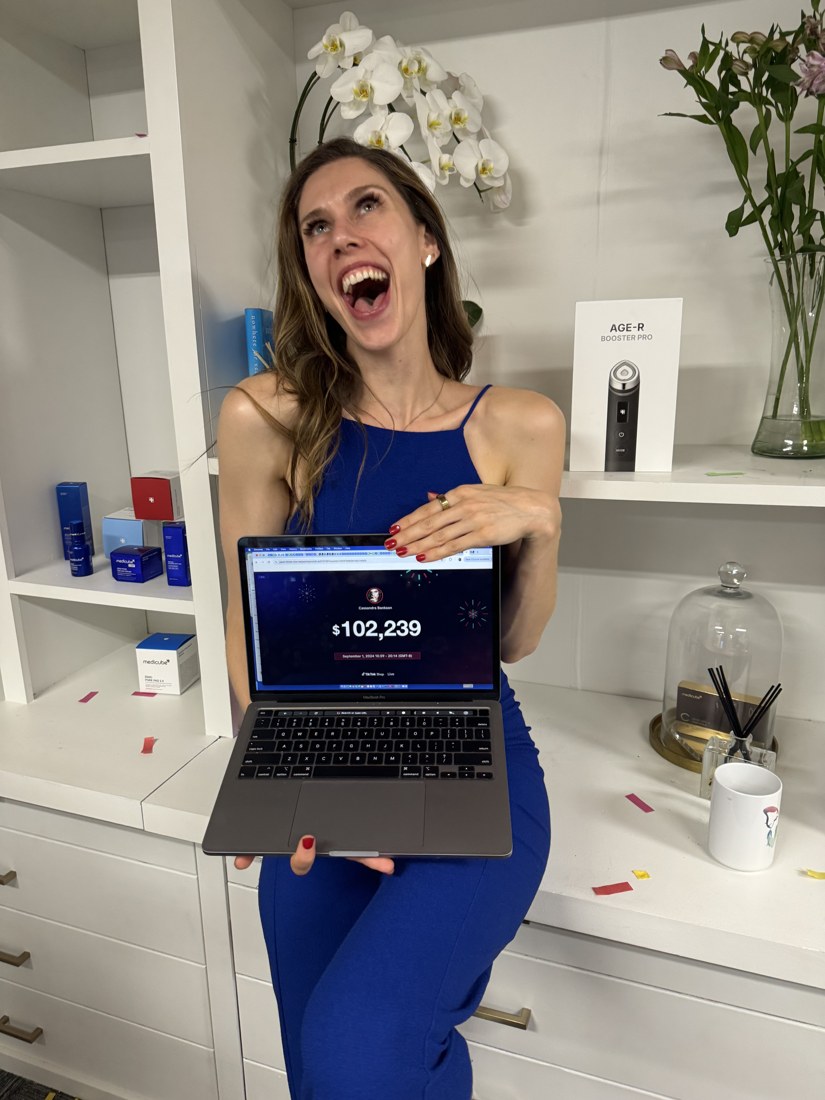 Cassandra Bankson holding a laptop showing 102,239 dollars in GMV after her TikTok Shop live for Medicube in Culver City