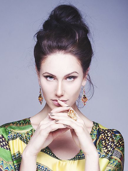 Cassandra Bankson portrait in a green dress